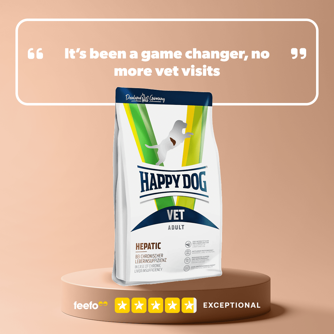 Happy Dog Vet Adult Hepatic dog food package on a beige background with text about vet visits.