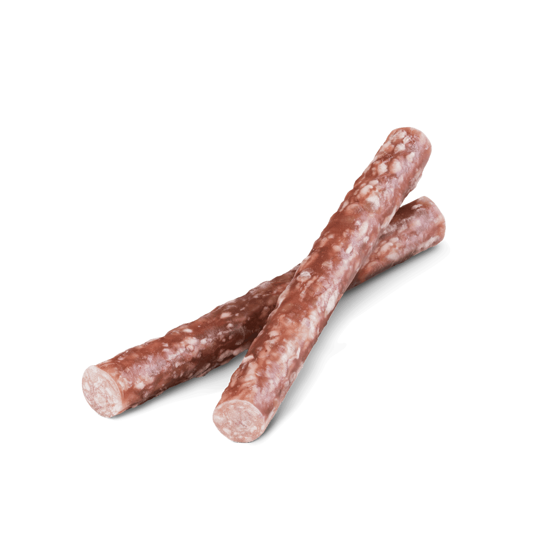 Two brown dog treats on a black background