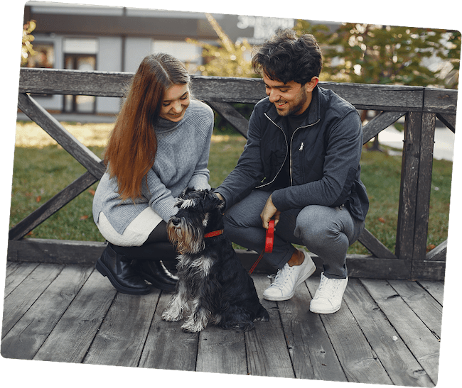 A couple with their dog